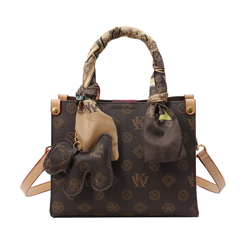 Bolso de impresión retro 2024 invierno nuevo bolso de tendencia temperamento de moda versátil hombro alto sentido ligero bolso de lujo de mujer