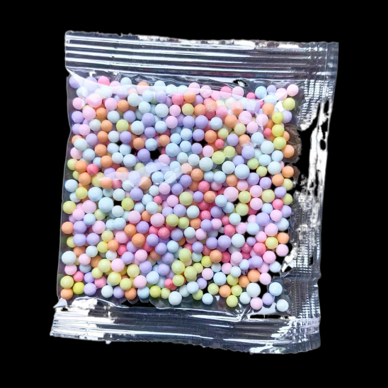 厂家供应0.3-1g袋彩色塑料泡沫球颗粒流星球填充装饰材料配件批发