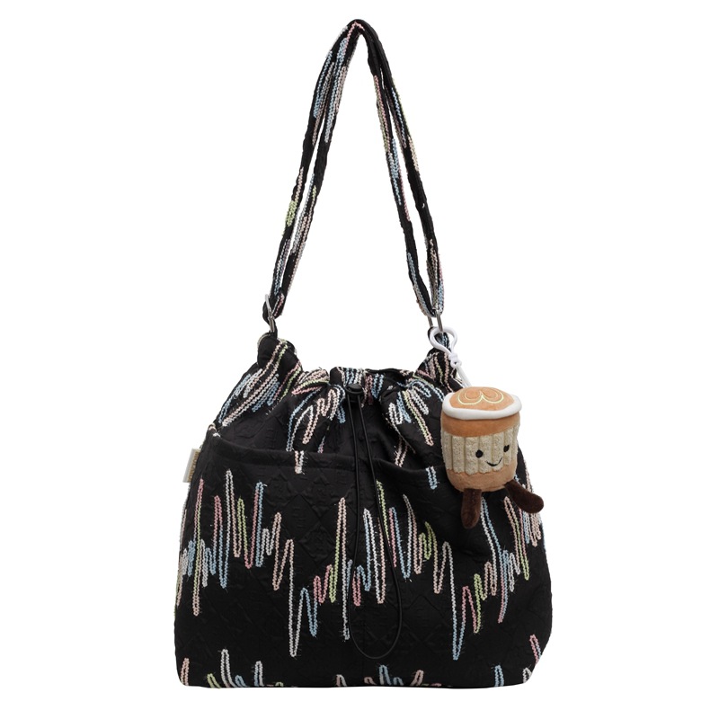 Alto sentido de la bolsa de lona de transporte casual versátil2024 nuevo bolso de mujer de verano popular gran capacidad bolso de cubo