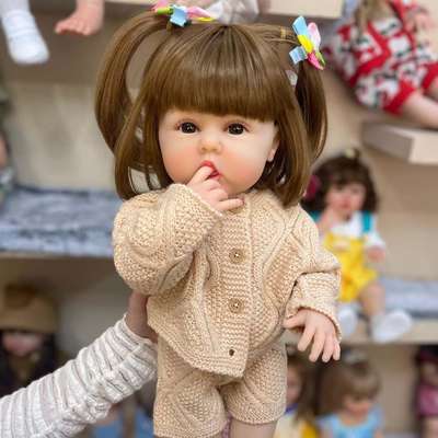 NPK 55cm full glue cute baby eating finger simulation baby reborn doll cross-border e-commerce supply