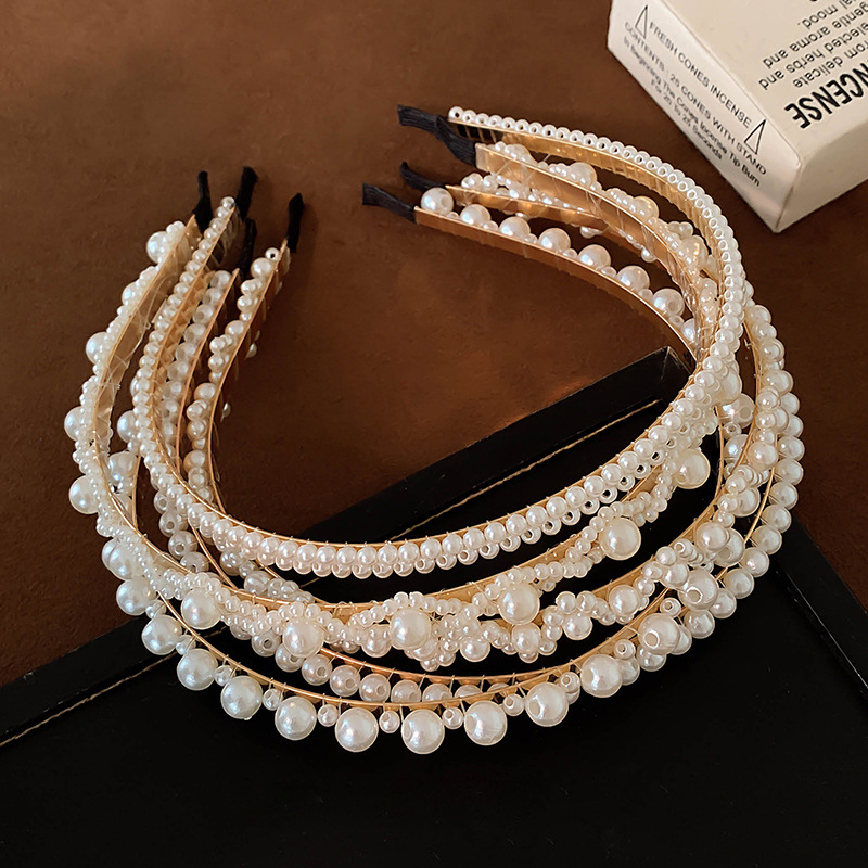 2025 nueva explosión tarjeta de cabello de perla de mujer de alta sensación de cabello tocado de cabello prensado joyas para el cabello universal