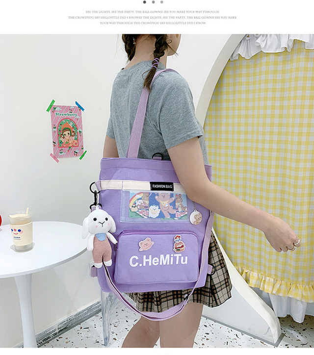 Korean-style canvas bag for girls with one shoulder, in the style of Harajuku, ulzzang, with a large capacity and contrasting colors, is a crossbody hand-held schoolbag for classes undefined