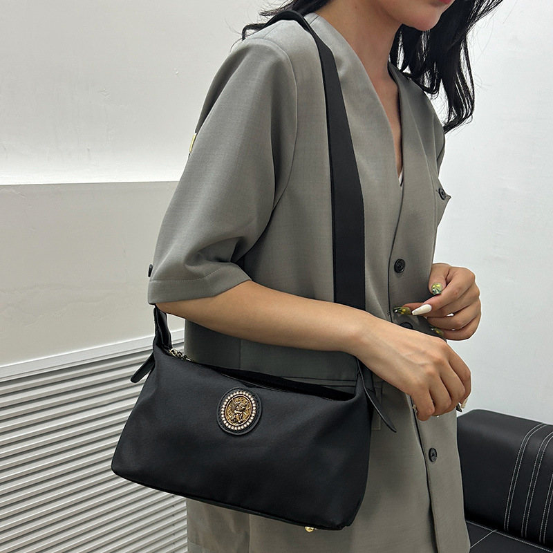 Bolso de mujer de alta calidad universal, nuevo estilo de moda, simple, ligero, elegante, mochila de hombro, mochila de trabajo casual.