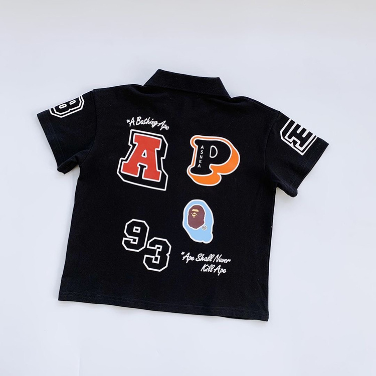 2023 Summer New Boys' Trendy Brand Letter Polo Shirt Small and Medium-sized Children's Black and White Short-sleeved T-shirt Lapel Top Trendy