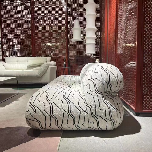 The Nordic designer's alien hippo steel tooth sand discovers modern small apartment French retro Wabi-Sabi style lamb wool sofa