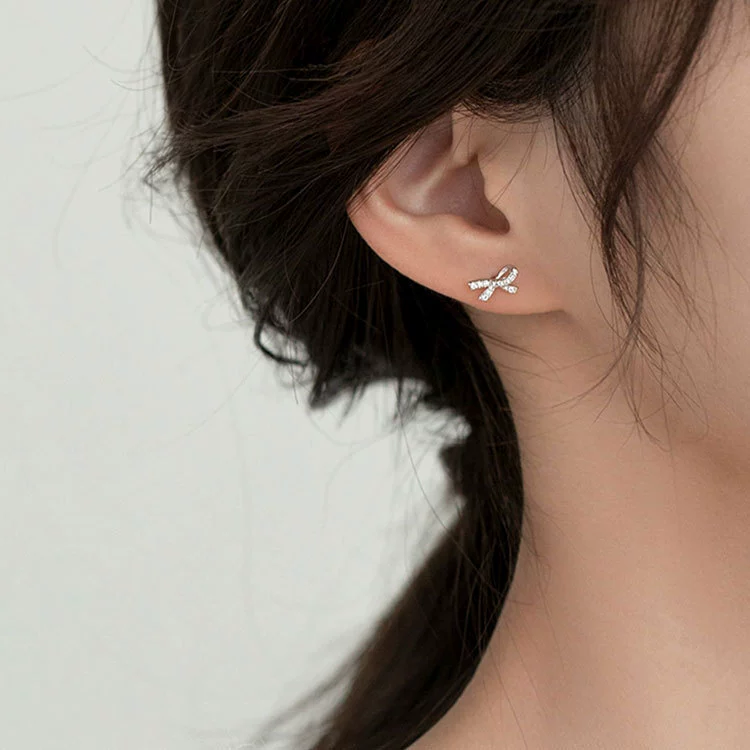 Серебряные сережки 925 пробы с zirconиям с бантом