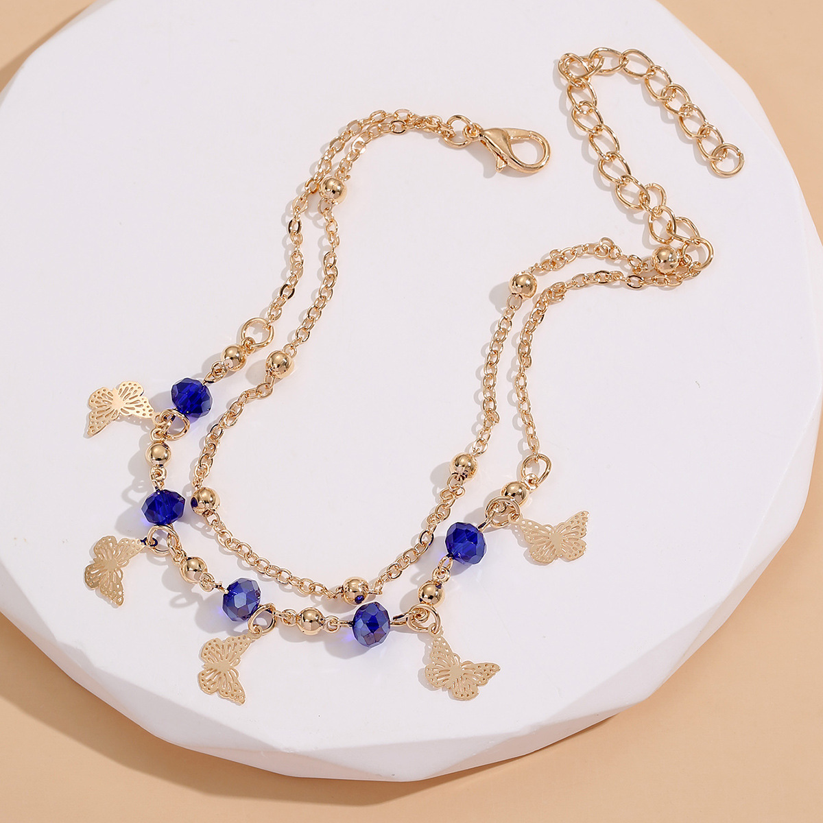Nuevo cross-border de playa europea y americana pulsera pulsera mujer diamantes huecos flores mariposas hechas a mano pie diseño famoso