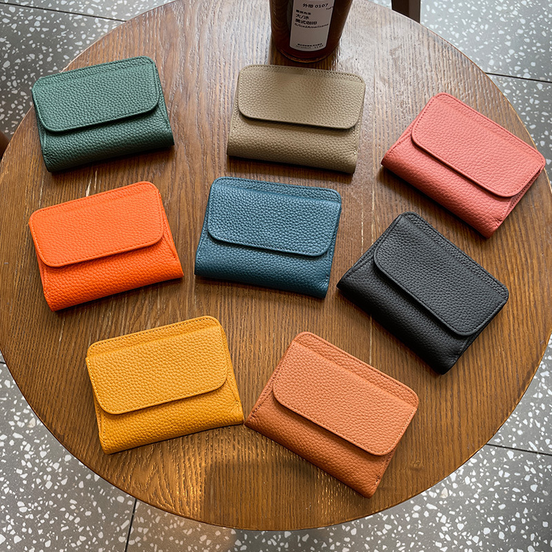 Cross-border first-layer cowhide women's thin half-folding short wallet casual compact mini multi-functional durable coin purse Cross-border first-layer cowhide women's thin half-folding short wallet casual compact mini multi-functional durable coin purse