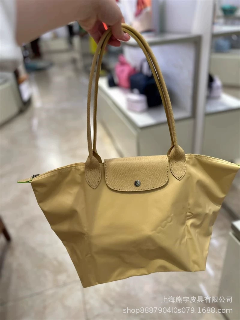 Foldable capacious purse for mother and baby, one-shoulder bag