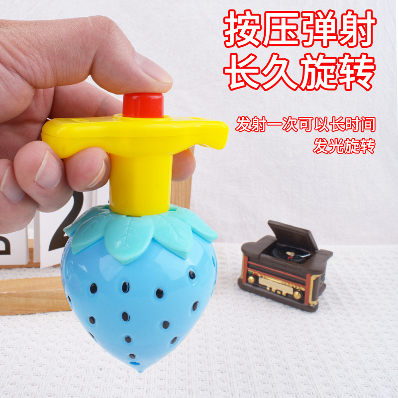 Juguetes de lanzamiento giroscópico luminoso de fresas giratorios de luz brillante para niños y niñas regalos de niños y niñas al por mayor