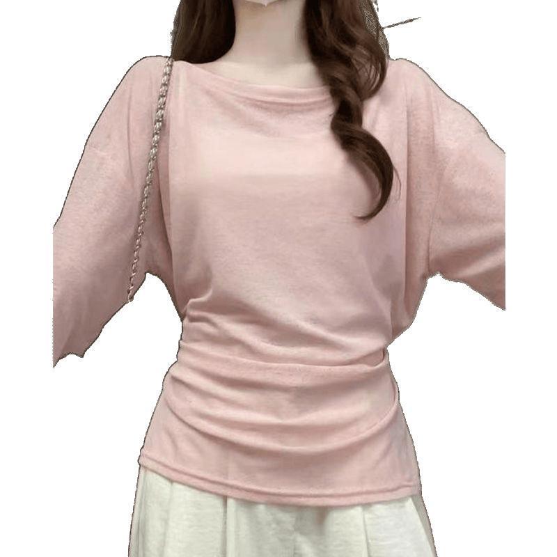 夏の薄っぺらな日焼け止めのブラウスはゆったりとしています。|undefined