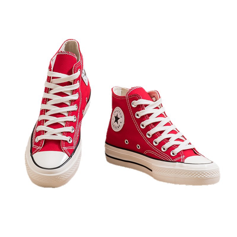 Año Nuevo 2026, zapatos de lona de alto nivel rojo para mujeres, zapatos casuales con suela de goma, moda de zapatos de alto nivel transpirables.