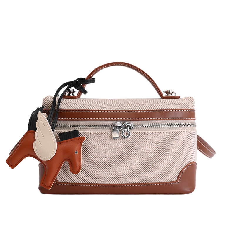 Caja de mano retro europea y americana bolsos pequeños cuadrados para mujeres nuevas ventas calientes de lona transfronteriza color de empalme de hombro único
