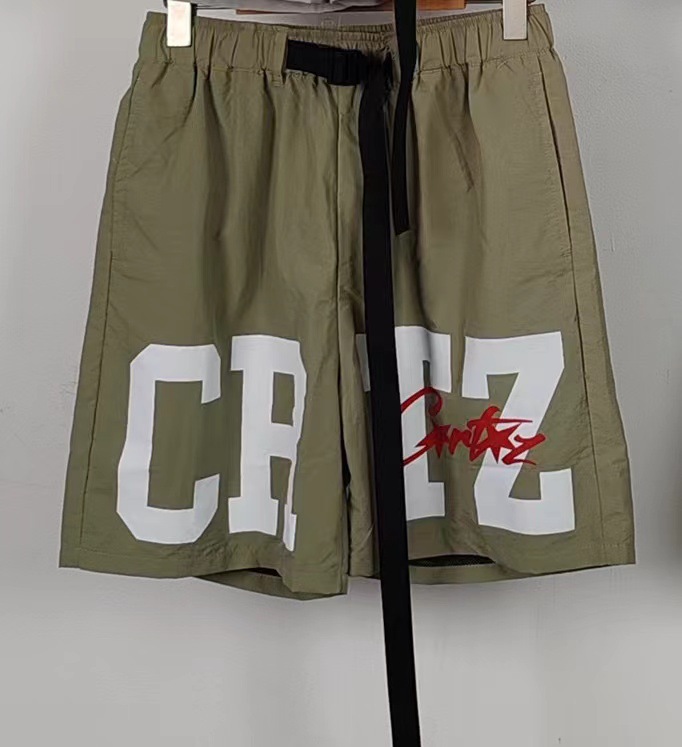 Shorts de secado rápido de playa verde militar con letras