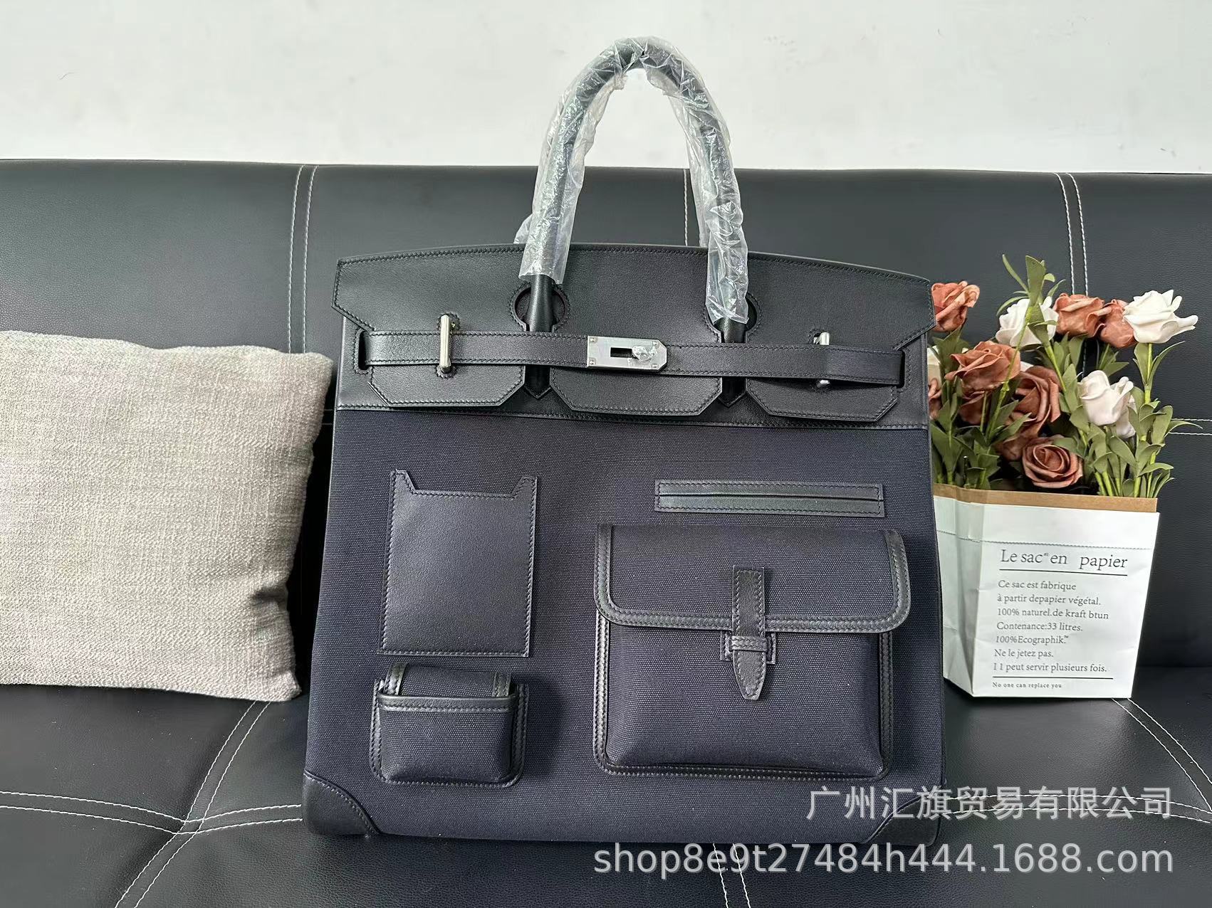 Bolsa de platino directa de fábrica Hac40 bolsas de viaje de color blanco y negro de gran capacidad pulsera de cuero de vaca real de hilo portátil