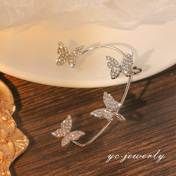 Butterfly silver left ear
