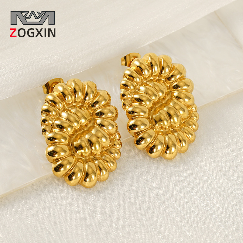 Venta caliente transfronteriza personalidad de nicho pendientes de temperamento retro mujeres diseño de textura geométrica sentido de acero de titanio pendientes al por mayor