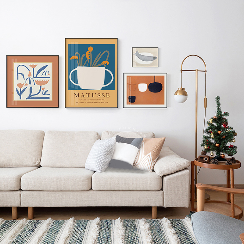 花の暮色北欧の客間の組み合わせはネットの赤い壁面の個性の抽象画のソファーの背景の壁の装飾画を掛けます。