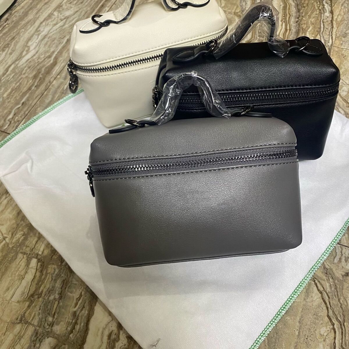 프랑스 새로운 COWHIDE LONGXIANG 작은 광장 가방 휴대용 도시락 가방 미니 크로스 바디 소녀의 만두 가방 상자 화장품 가방