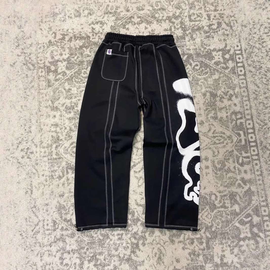 Pantalones de hombre de tendencia transfronteriza europea y americana nueva moda hip-hop street retro holgado casual estampado recto pantalones casuales