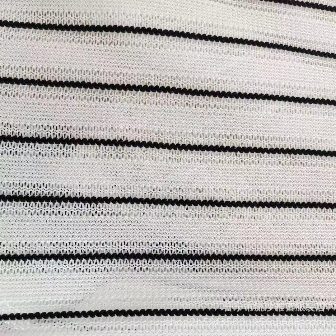 多色涤纶经编提花网眼布米字花黑白条网布粗针累蕾丝上衣面料批发