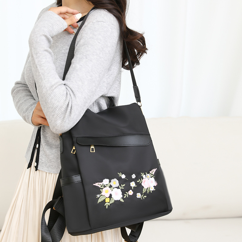 2024 nueva mochila antirrobo bordada para mujer estilo étnico moda flor ocio mochila de viaje de un solo hombro de doble uso