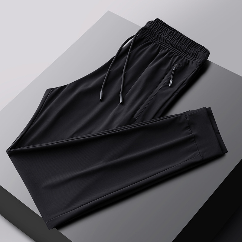 2025 verano pantalones deportivos de talla grande pantalones de hombre pantalones de aire acondicionado pantalones de seda de hielo de secado rápido pantalones de pierna recta gorda al por mayor