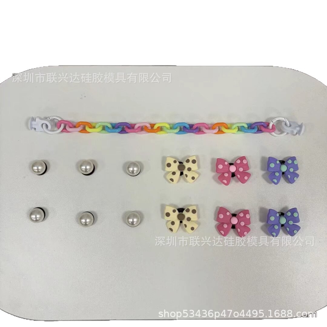 Cross-border nuevo bogg bolso colgante DIY perlas margaritas arco iris hebilla cadena bolsa de playa zapatos accesorios de flores