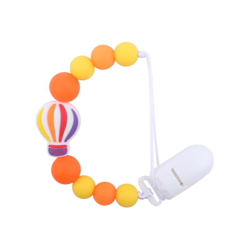 Nuevo bebé suministros chupete cadena creativa dibujos animados globo de aire caliente de silicona mordedura cadena anti-gota molar