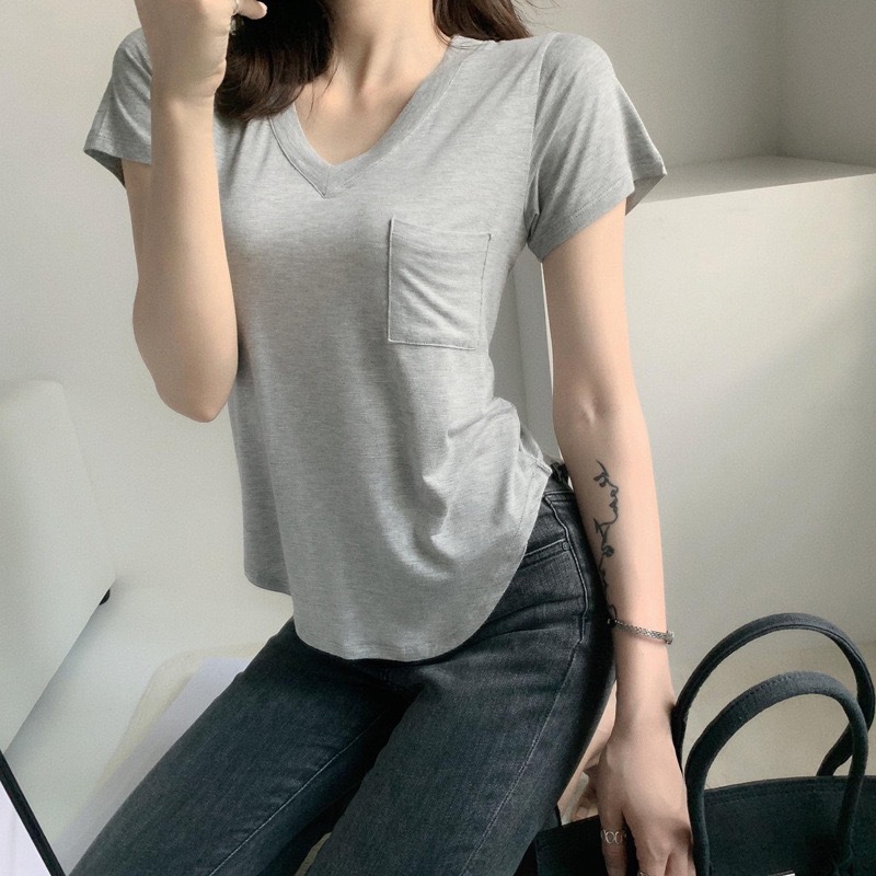 2026 verano nueva camiseta de algodón de alta calidad de manga corta cuello en V suelto delgado universal de moda irregular camiseta de mujer