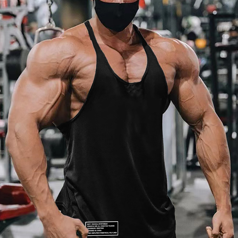 Europa y América profesional bodybuilding fitness hombres de algodón profunda excavación sexy suelta deportes delgada Correa hombro camisola hombres