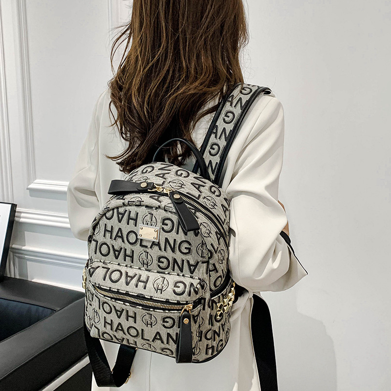 Mochila de fábrica para mujer 2023 nueva moda de verano estilo coreano moda de mujer mochila de gran capacidad bolsa pequeña de viaje para mujer