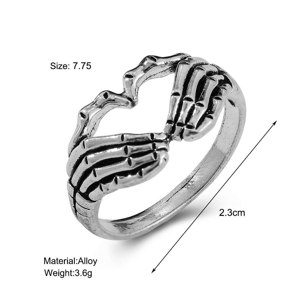 Retro Heart Gesture Skull Hand Ring Wholesale Nihaojewelry display picture 1