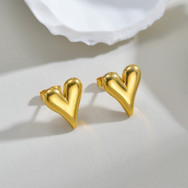 Europeo y americano retro de acero inoxidable 18K chapado en oro pendientes encantadores nicho diseño brillante exquisito pendientes de mujer