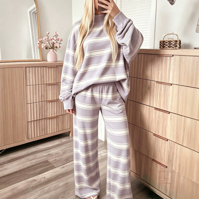 European and American style striped two-piece women's outfit: a half-turtleneck long-sleeved sweatshirt paired with high-waisted, wide-leg trousers, perfect for comfortable loungewear European and American style striped two-piece women's outfit: a half-turtleneck long-sleeved sweatshirt paired with high-waisted, wide-leg trousers, perfect for comfortable loungewear