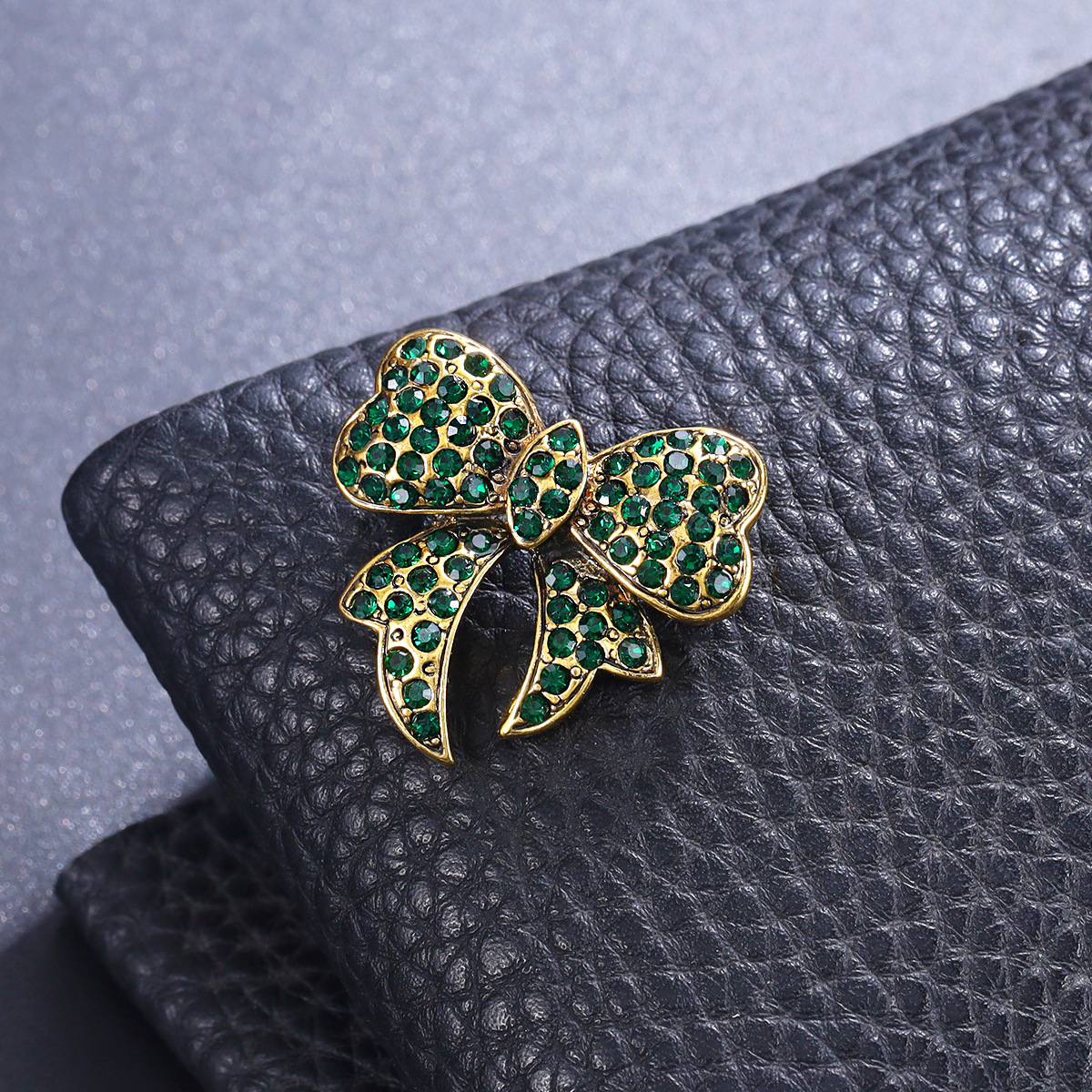 Sophisticated cute metal brooch with bow