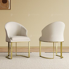 意式现代轻奢餐椅极简不锈钢设计师高端皮革绒布加厚座包艺椅子