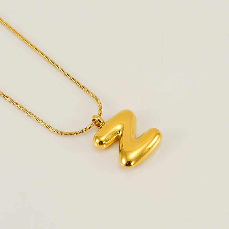 Burbujas transfronterizas 26 letras inglesas colgante brillante collar nicho universal oro acero titanio joyería collar