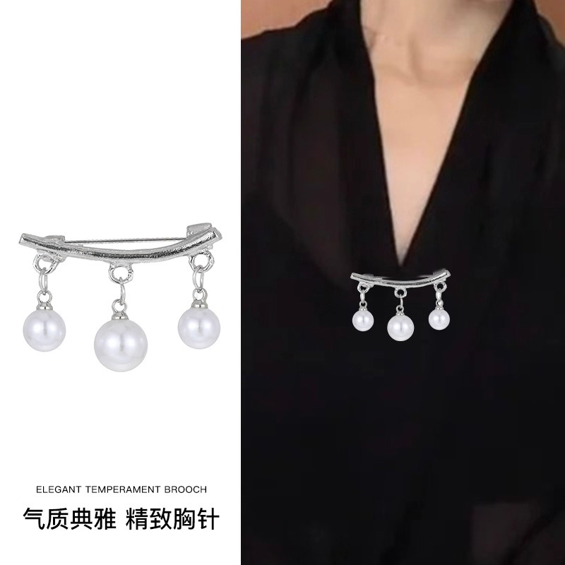 Temperamento bowknot perla alfileres mujer exquisita hebilla anti-luz sensación de alto nivel cintura artefacto cintura pantalones pequeña hebilla fija