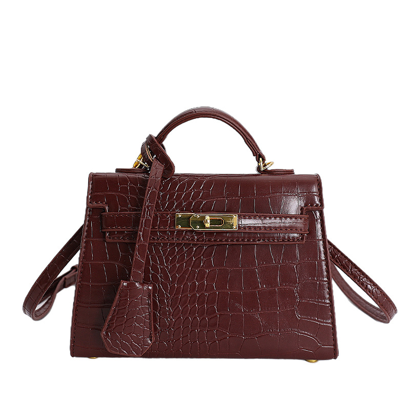 Bolso de mano caliente para mujeres 2025 nuevo estilo transfronterizo de alto nivel con patrón de cocodrilo lujoso y versátil bolso de hombro