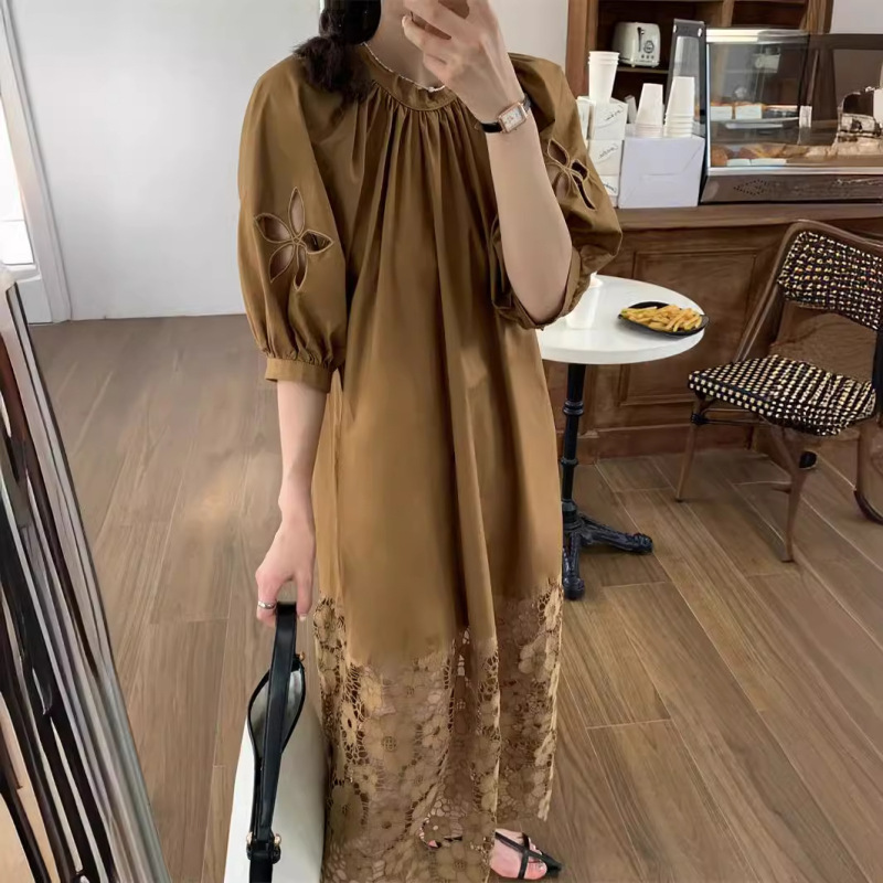 小衆の怠惰な風のカレー色のワンピースの女性の夏のお茶の休憩のフランスの気質の透かし彫りのレースのゆったりしているカジュアルな長いスカート|undefined