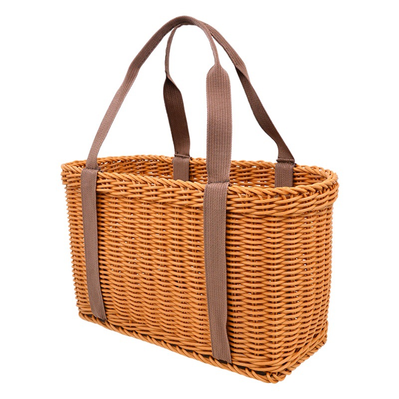 Imagen artesanía nuevo estilo pastoral tejido a mano respetuoso con el medio ambiente durable compras en casa cesta portátil cesta de almacenamiento de ratán