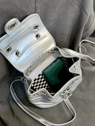 Autumn new silver backpack for women Korean niche design water ripple versatile chain school bag for female college students
