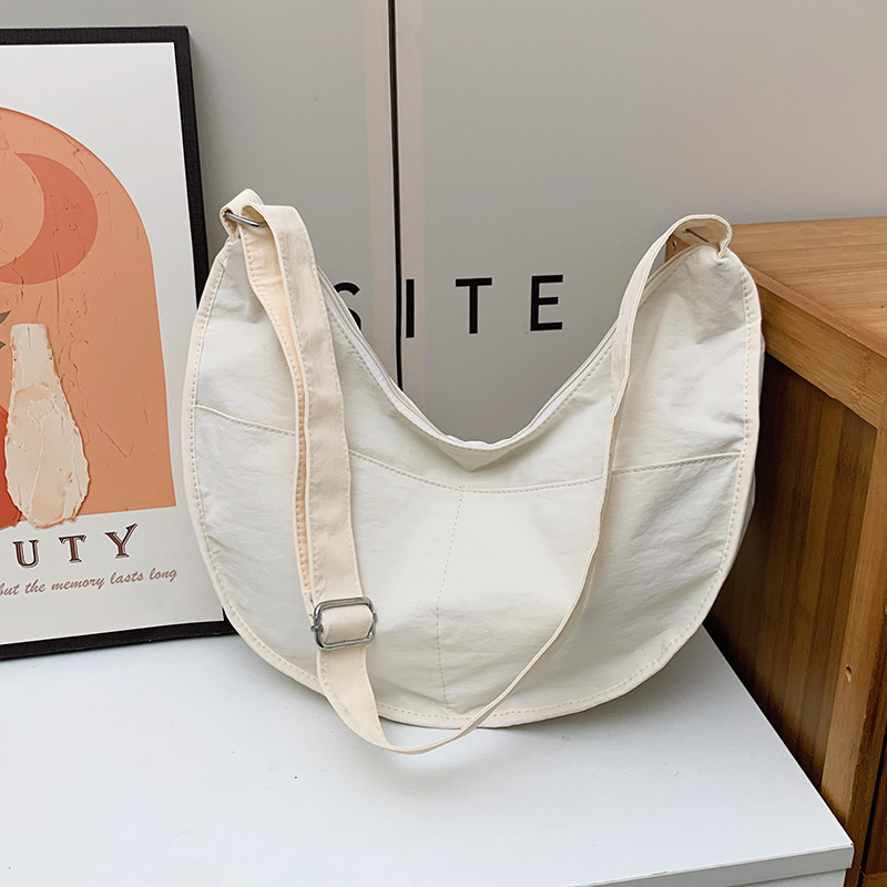 Bolsa de hombro coreana para niños y niñas de color sólido de gran capacidad bolsas de饺os para niños 2025 nuevas bolsas para niños con colgantes