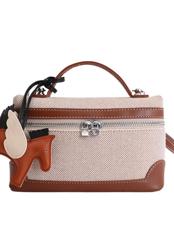 Bolso de mano de alta sensación 2026 nuevo lienzo de moda bolso de color pequeño bolso cuadrado de viaje bolsa de mochila ocio