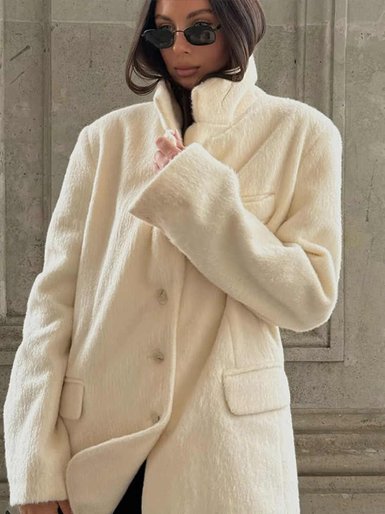 Moda simple temperamento de color sólido con solapa de peluche tipo chaqueta corta 2025, nuevo otoño y invierno transfronterizo Europa y América