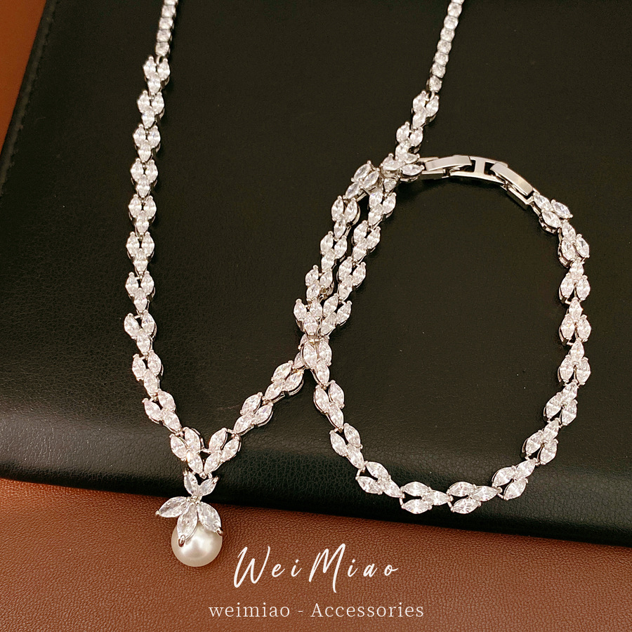 Collar de perlas de zircón ligero de lujo nicho clavícula personalidad exquisita moda alta sensación conjunto de joyería al por mayor