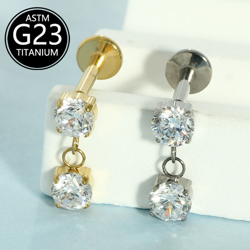 Silver pointed spike labret stud material detail
