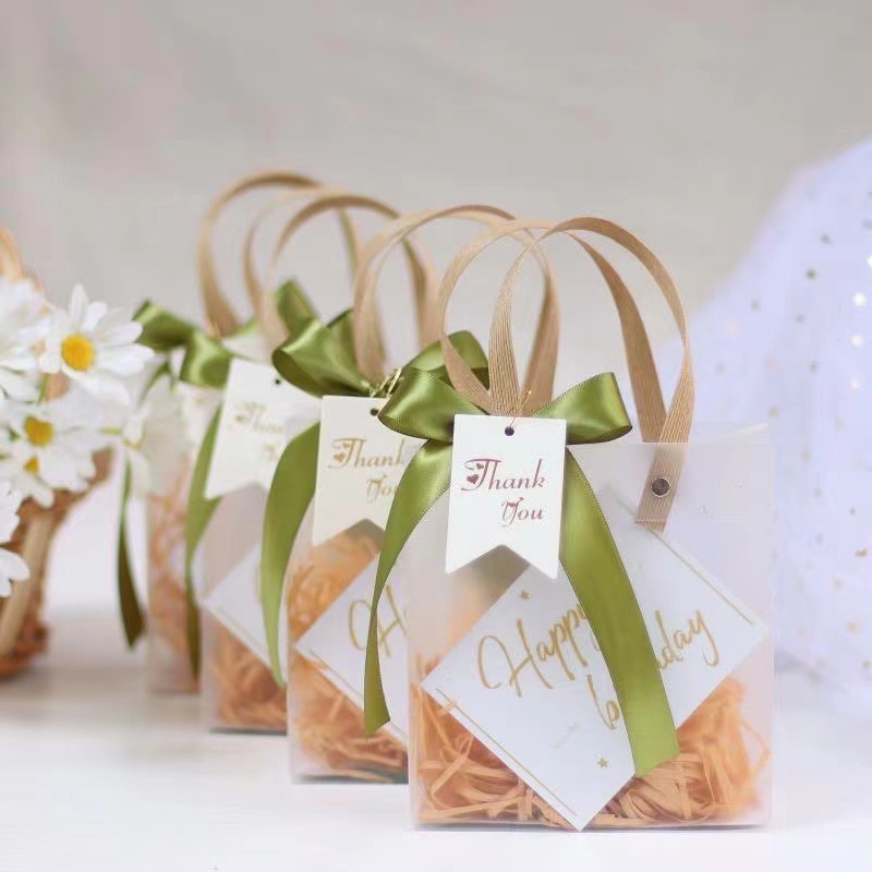 Bolsas de regalo de cinta verde del 1 de junio, bolsas de mano transparentes, cajas de regalo de dama de honor de alta calidad, bolsas de PVC