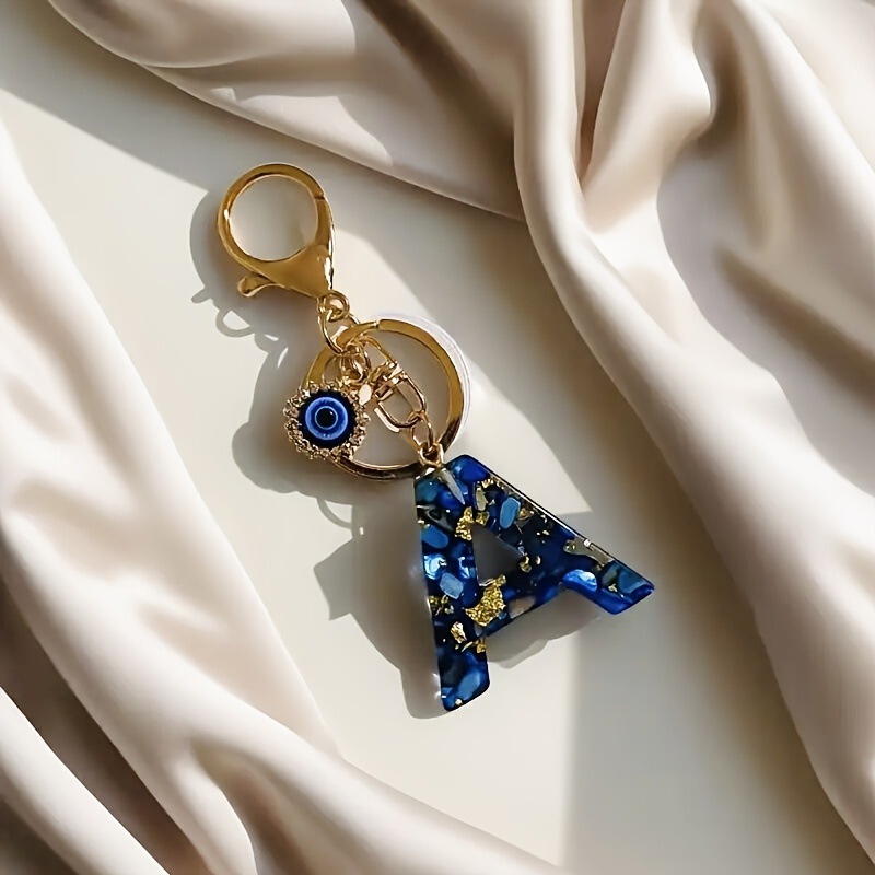 クロスボーダー新樹脂サファイアブルー英字キーホルダー悪魔の目レディースバッグペンダントスクールバッグペンダント|undefined